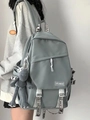 Minimalist grey nylon multi-pocket backpack for students shown in a stylish side-back view - Grey Frog Charm / Blue