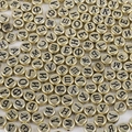 Retro gold 4x7mm acrylic flat beads featuring black engraved Russian alphabet letters - Antique Gold Russian Letters