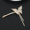Elegante pinza de pelo de mariposa dorada con diamantes de colores y borlas largas - Dorado