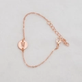 Rose gold alphabet bracelet featuring a circular 'W' pendant and elegant link chain - Rose Gold W