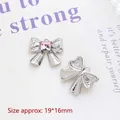 Detailed view of silver bow alloy pendant with pink square rhinestone and 19x16mm dimensions - 2# Small Bow Pink Rhinestone