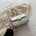 Silver quilted crossbody bag with golden chain strap and elegant metallic square buckle - Silver