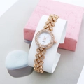 Montre femme élégante en or rose avec bracelet en strass feuilles sur support de montre - Or rose
