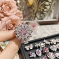 Macro detail of silver flower ring with Asscher cut pink zircon and pavé diamonds - Style 0615-Flower Design Pink Stone