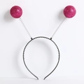 Detail of pink glitter alien antenna headband with silver springs and sequin balls - Rose Red Glitter Foam Ball Headband