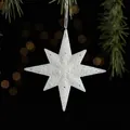 Sparkly white 13cm star Christmas ornament with fine glitter and hanging string - Starburst Style 2