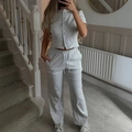 Completo casual da donna in maglia a coste grigia con top a maniche corte e pantaloni - S / Grigio Melange Chiaro