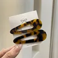 Set de dos pinzas para el cabello de acetato carey ámbar en tarjeta de cartón - Carey Café