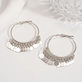 Macro detail of silver layered disc hoop earrings on a minimalist decorative background - Silver Needle-Silver Round Disc Style