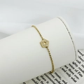 Bracciale a catena con sfere dorate e un pendente a pentagono con zirconi bianchi - Stile Zircone Pentagono (B0028F)