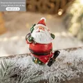 Painted resin Santa Claus figurine with black gift bag, 7cm tall Christmas tabletop decor - Medium Santa Claus Style A (With Black Gift Bag)