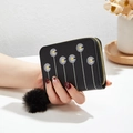 Short black PU leather wallet with white daisy embroidery and fluffy pom-pom zipper - Black