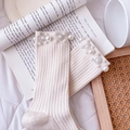 Elegant beige mid-calf cotton socks with pearl and flower accents on open book - One Size (EU 34-39) / Beige