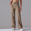 Detail view of high waisted drawstring waistband and side pockets on khaki yoga pants - S / Cocoa