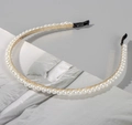 Close-up of elegant gold metal headband with white pearls and black anti-slip ends - 6mm Single Row Thick Pearl Headband