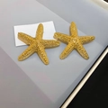Golden starfish earrings with textured grain finish for elegant beach vacation style - 925 Sterling Silver Earring Post - Gold Grain Textured Starfish Stud Earrings