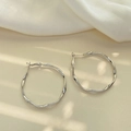 Silver twisted wave textured hoop earrings with retro metallic finish and 925 silver pins - E6050 Silver Wavy Hoops