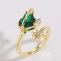 Detail van 14K goud hartvormige groene zirkoon ring met sterren en melkweg ontwerp - Groene Zirkonia