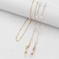 Fashionable gold eyewear chain with white pearls and clear crystals on a white stand - 70cm / Pearl Crystal Handmade Chain
