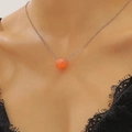 Gothic punk zilveren ketting met een doorschijnende oranje schedel hanger van hars - Wit K Halsketting (4883)