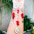 Silver butterfly suncatcher with red stones and moon pendant on arm display - Synthetic Red Glass