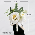 Elegant white artificial rose boutonniere for wedding groom with ribbon and green leaves - Corsage / Ivory