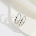 Polished silver heart hoop earrings with sparkling white zircons for women - U-shape (Silver)