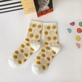 White cotton crew socks with all-over yellow smileys and SMILE! graphic prints - One Size / White All-over Smiley