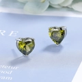 Elegant heart-shaped olive green zircon stud earrings with silver three-prong setting - Olive Green Zirconia