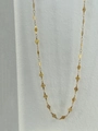 Detailed macro of 18k gold plated waist chain featuring textured diamond-shaped charms - Rhombus Style / Gold