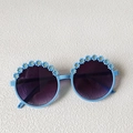 Kids round sunglasses in sky blue frame with 3D daisy flowers and purple lenses - Blue