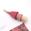 Three-layer gradient pink and beige tassel keychain with gold metal clasp on white surface - Style G (Pink Gradient)