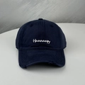 Detailed macro view of distressed navy baseball cap with white Haaaaapy letter embroidery - One Size (58-60cm) / Navy Blue
