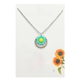 Dettaglio della collana con ciondolo a girasole argento su biglietto ispiratore - Blu