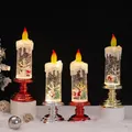 Three LED Christmas lanterns with Santa, Snowman and Tree in red gold silver bases - Gold Base Christmas Candle Lantern Style (2256)