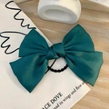 Satin bow hair clip in forest green finish on a minimalist canvas background - Hair Tie / Dark Green