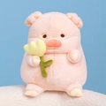 Pink plush pig doll with yellow tulip flower made of soft sherpa fleece on blue background - Yellow Tulip Pig