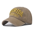Detailed close-up of yellow 3D Florida embroidery on a khaki washed cotton baseball cap - Adjustable / Khaki