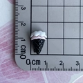 Macro view of a 1.5cm black and pink resin ice cream miniature for nail art and DIY crafts - 01-Black Pink Cream Sundae Cone