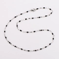 Silver titanium steel thin necklace featuring black enamel lip-shaped accents - Steel + Black Enamel