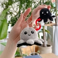 Reversible plush octopus keychain showing grey happy and black sad expression - Grey to Black - Normal Chain