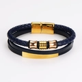 Detail eines dunkelblauen Lederarmbands mit goldfarbenem und roségoldenem Magnetverschluss - Marineblau Drei-lagiges Roségold Dekor (款3)