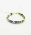 Detail of bohemian hand-woven surf bracelet with adjustable knot and ethnic pattern - Size 19