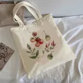 Off-white canvas tote bag featuring red tomato and green pepper botanical print - C14 Tomato Illustration