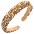 Details eines luxuriösen gepolsterten Haarreifs mit Gold- und Silber-Strass und Perlen - Gold