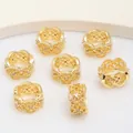 Macro shot of 14K gold plated hollow spacer beads with micro-set cubic zirconia details - Micro Pave Hollow Spacer 6x11mm ID 7mm / 18K Gold Plated/Color Retention