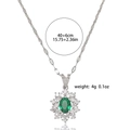 Silver necklace with green oval emerald pendant and snowflake halo diamonds - Emerald Necklace