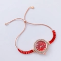 Detail of rose gold bracelet watch with red dial and crystal charms on white background - Rose Gold-Round Red Dial (Jiali)