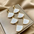 Long tassel drop earrings featuring gold shell fan charms on elegant silk fabric - Iridescent Shell Fan Shape (E2301-2)