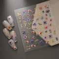 Detail of floral nail stickers with gold foil lettering and 3D embossed flower patterns - Flower English Phrases Style (CO-273)